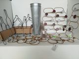 a display of wine bottles and glasses on a shelf
