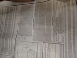 a newspaper that has a picture of a person on it