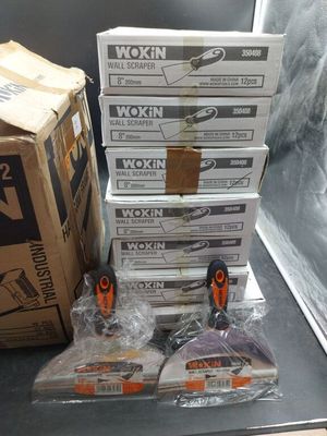 several boxes of workin tools sitting on top of a table