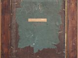 an old picture of a wooden frame with a piece of paper in it