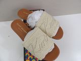 an image of a pair of women ' s slippers on top of a box