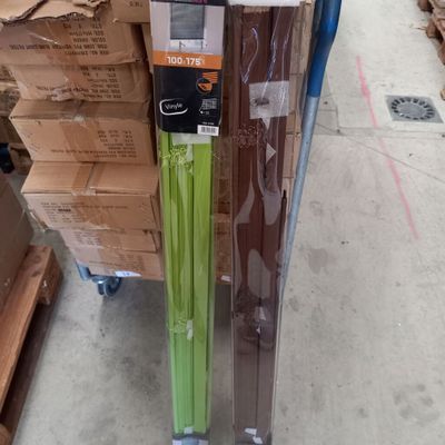 two umbrellas that are sitting on a cart in the store