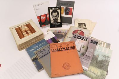 a lot of books that are on a table