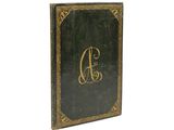 un vieux livre avec une initiale dorée et une couverture noire