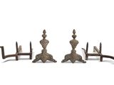 pair of antique cast iron candlesticks with wooden bases