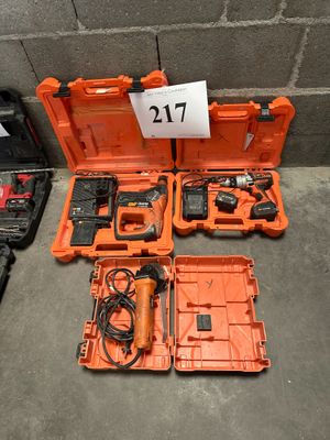 many tools in the orange case on the floor