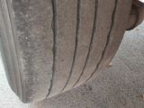 a close up of a tire on a truck