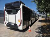 a bus that is parked on the side of the road