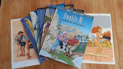 several children ' s books sitting on top of a wooden table