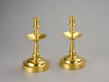 pair of brass candlesticks with candlestick holders