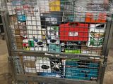a metal cart with many items in it in a warehouse