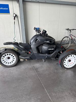 a motorcycle with a side car attached to it