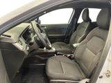 the interior of a car with the front seats folded down