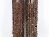 pair of large wicker vases with glass inserts on each side