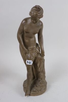 a statue of a man holding a dog on a white background