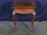 an image of a small table with a drawer on top of it