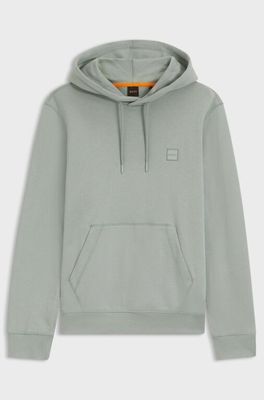 une photo d'un sweat-shirt gris avec une capuche