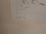 a picture of a drawing of a cat on a wall