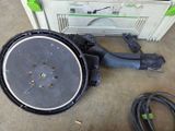 a picture of a blower sitting on the floor next to a box