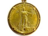 an image of a close up of a gold coin with a woman on it