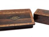 two wooden boxes that are sitting next to each other