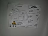 a picture of a wall mounted water heater with instructions