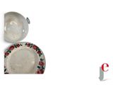 two plates and a bowl sitting on a table