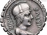 a silver coin with a woman ' s head and a crown on it