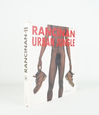 an image of a book with a picture of a naked man holding a pair of shoes