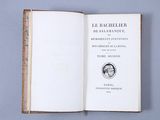 an open book with a picture of a man on it