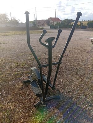 a bike that is sitting in the middle of a field