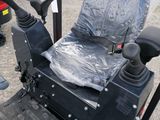 an image of a tractor with a seat on it ' s back