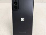 a close up of the back of a black samsung galaxy s20