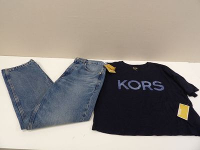 kors jeans and t - shirt on a white table