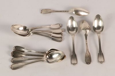 several spoons and spoon spoons are arranged on a white surface
