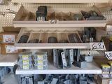 many shelves in the store that have various items on them