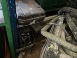 a picture of a pile of assorted items in a garage