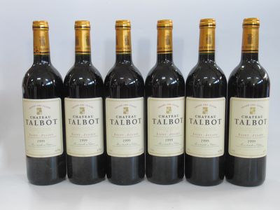 six bottles of red wine are lined up in a row