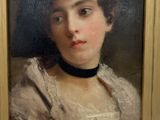 portrait of a young woman in a white dress with a black choker