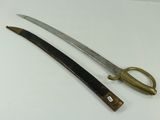 pair of two swords with gold handles on a white surface