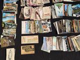 many cards laid out on a table with a black table cloth