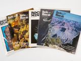 four books of rock and mineral magazines on a white surface