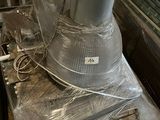 a metal stove that has been wrapped up and ready to be used