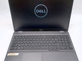 the dell laptop is open and ready to be used