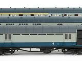 a blue and grey train car with a yellow stripe