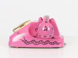 a pink phone with a cat on it on a white surface