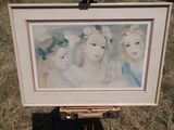 a picture of a painting on a easel in the grass
