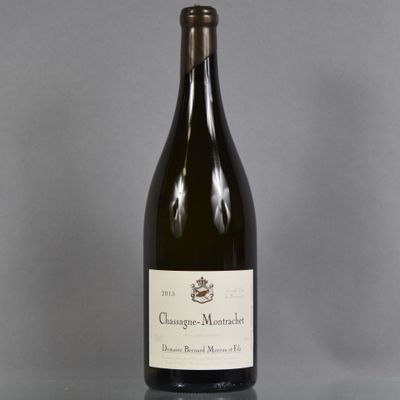 a bottle of wine that is sitting on a table