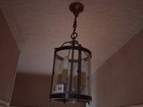 a light that is hanging from the ceiling in the room