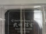 a plastic box with a small electronic device inside of it